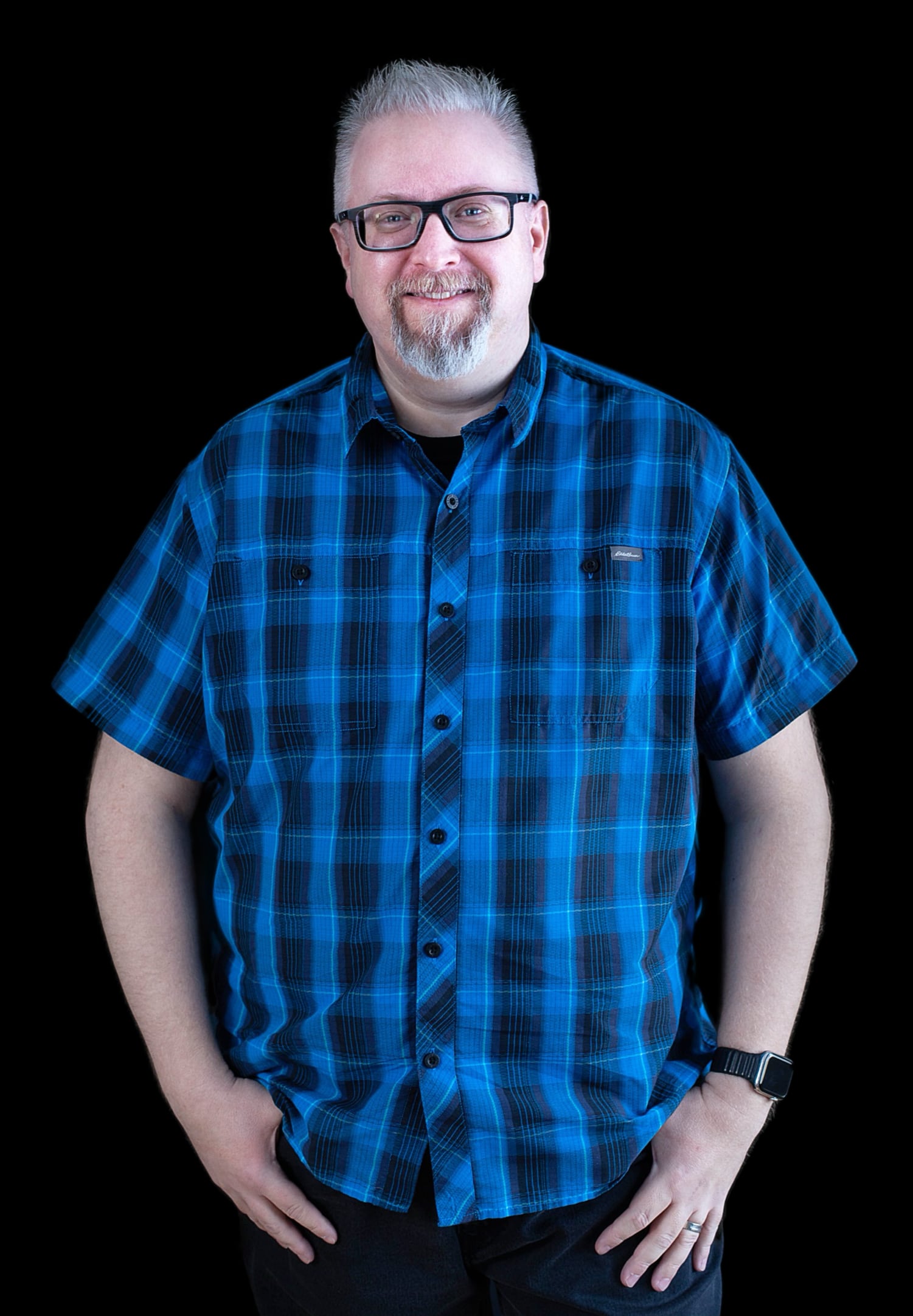 Tamas wearing a blue shirt.